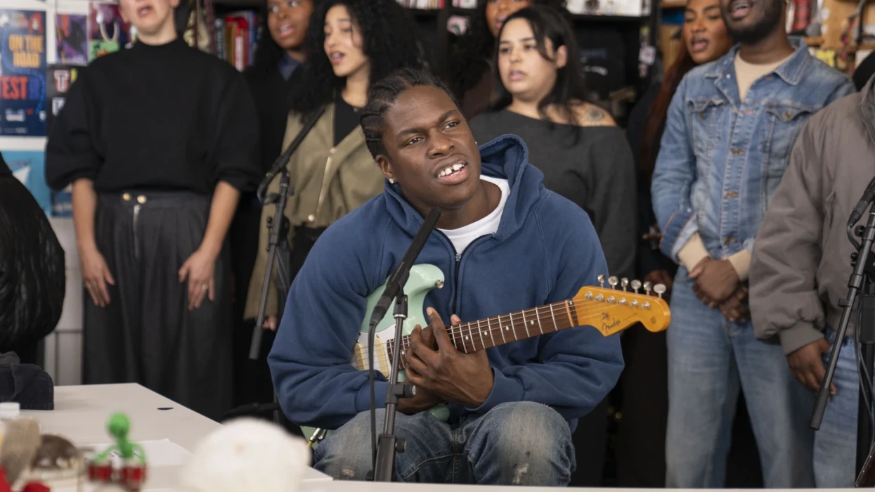 Daniel Caesar returns to NPR Tiny Desk with 12-piece choir